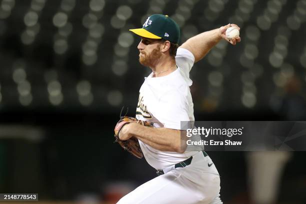 Michael Kelly of the Oakland Athletics pitches against the St. Louis Cardinals in the sixth inning at Oakland Coliseum on April 15, 2024 in Oakland,...