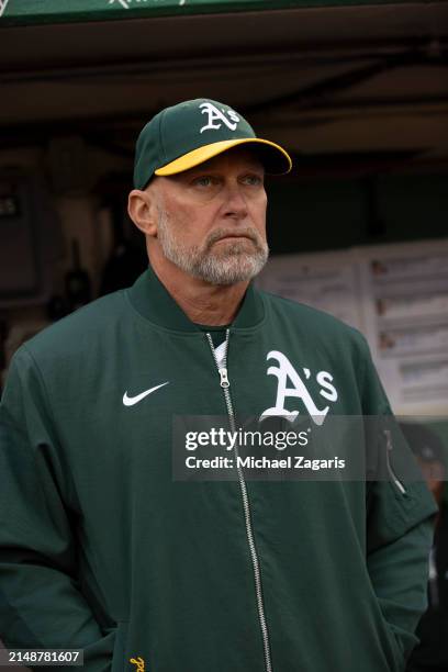 Manager Mark Kotsay of the Oakland Athletics in the dugout before the game against the Cleveland Guardians at the Oakland Coliseum on March 28, 2024...