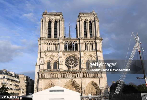 General view of the Notre Dame Cathedral, which was ravaged by a fire in 2019, with a new spire, surmounted by the rooster and the cross, as...