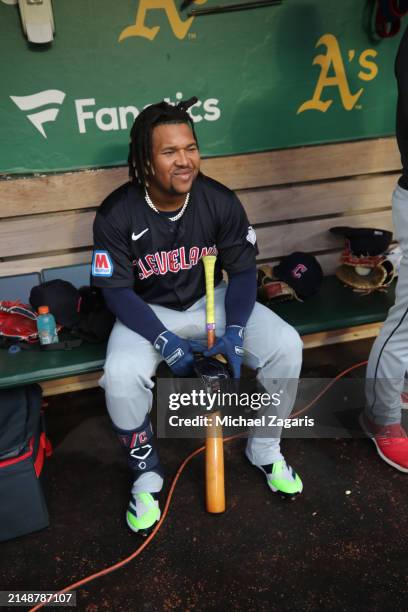 Jose Ramirez of the Cleveland Guardians in the dugout before the game against the Oakland Athletics at the Oakland Coliseum on March 29, 2024 in...