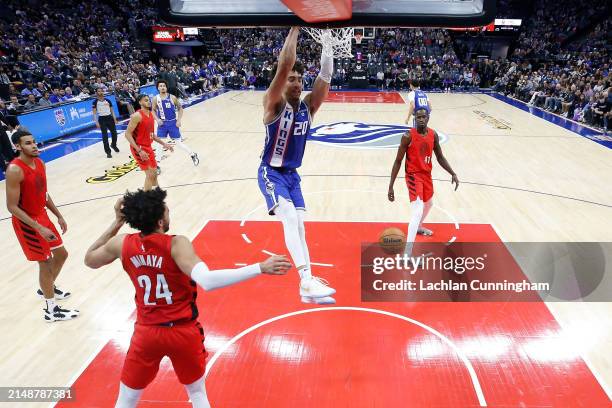 Colby Jones of the Sacramento Kings dunks the ball in the fourth quarter against the Portland Trail Blazers at Golden 1 Center on April 14, 2024 in...
