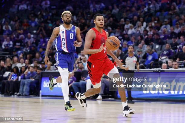 Kris Murray of the Portland Trail Blazers dribbles the ball up court in the fourth quarter against the Sacramento Kings at Golden 1 Center on April...