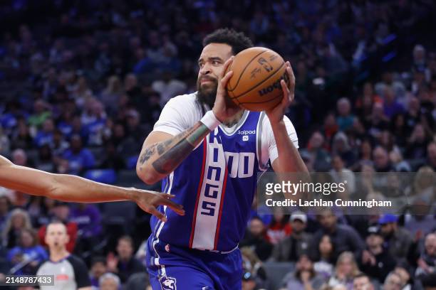 JaVale McGee of the Sacramento Kings passes the ball in the fourth quarter against the Portland Trail Blazers at Golden 1 Center on April 14, 2024 in...