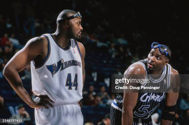 Harvey Grant, Power Forward and Small Forward for the Washington Wizards looks on to talk with his brother Horace Grant, Power Forward and Center for...
