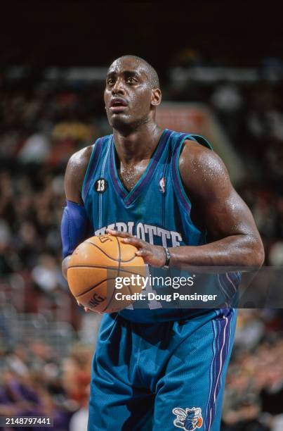 Anthony Mason, Power Forward, Small Forward, and Center for the Charlotte Hornets makes a free throw shot during NBA Atlantic Division basketball...