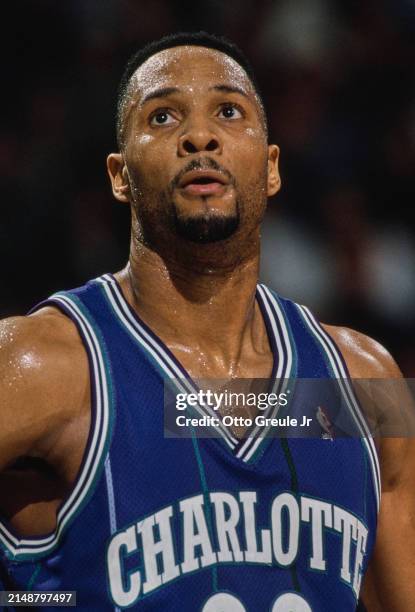 Alonzo Mourning, Center and Power Forward for the Charlotte Hornets looks on during the NBA Pacific Division basketball game against the Portland...