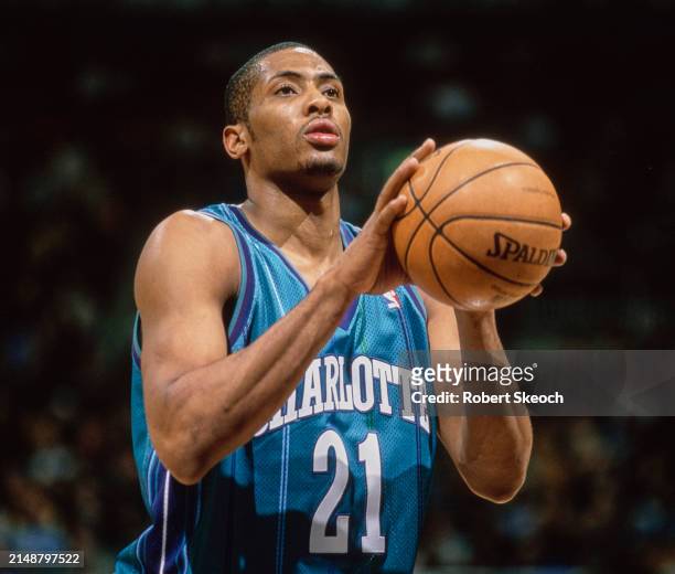Ricky Davis, Shooting Guard and Small Forward for the Charlotte Hornets prepares to shoot a free throw during the NBA Central Division basketball...