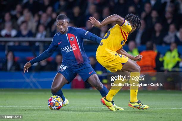 Nuno Mendes of Paris Saint-Germain defended by Jules Koundé of Barcelona during the Paris Saint-Germain V Barcelona, UEFA Champions League,...