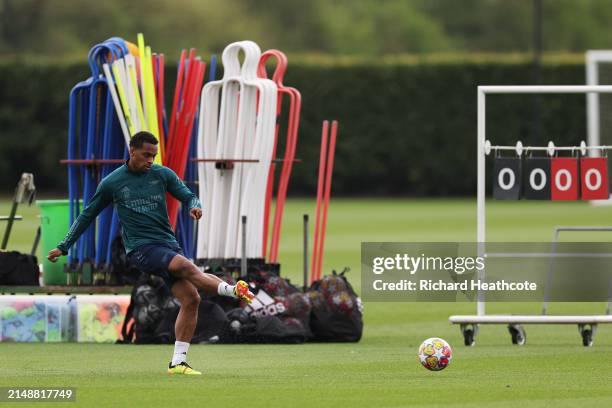 Jurrien Timber of Arsenal passes the ball during a training session at London Colney on April 16, 2024 in St Albans, England.