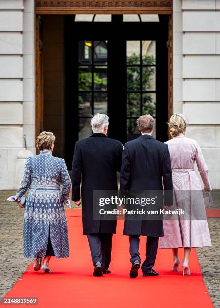 King Philippe of Belgium and Queen Mathilde of Belgium welcome Grand Duke Henri of Luxembourg and Grand Duchess Maria Teresa of Luxembourg during an...