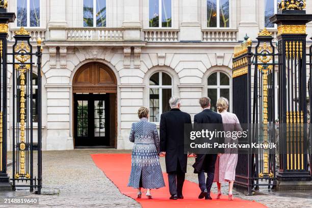 King Philippe of Belgium and Queen Mathilde of Belgium welcome Grand Duke Henri of Luxembourg and Grand Duchess Maria Teresa of Luxembourg during an...