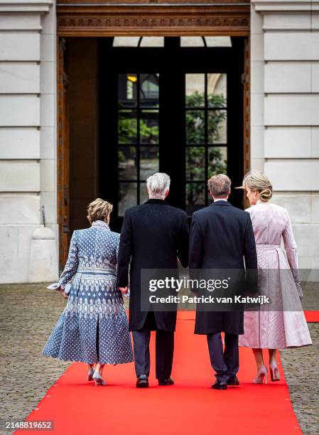 King Philippe of Belgium and Queen Mathilde of Belgium welcome Grand Duke Henri of Luxembourg and Grand Duchess Maria Teresa of Luxembourg during an...