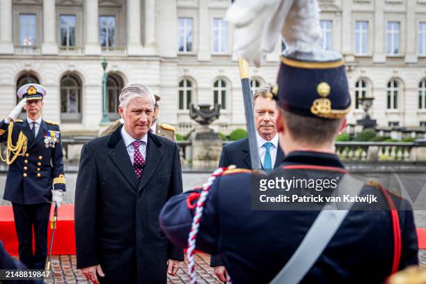 King Philippe of Belgium and Queen Mathilde of Belgium welcome Grand Duke Henri of Luxembourg and Grand Duchess Maria Teresa of Luxembourg during an...