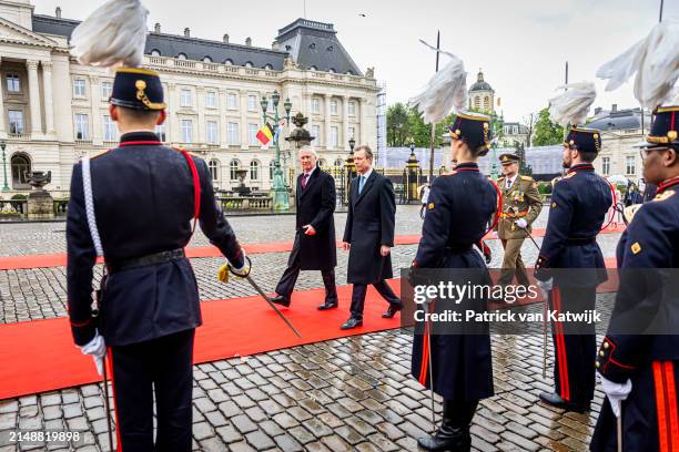 King Philippe of Belgium and Queen Mathilde of Belgium welcome Grand Duke Henri of Luxembourg and Grand Duchess Maria Teresa of Luxembourg during an...