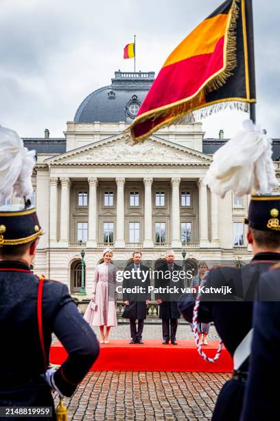 King Philippe of Belgium and Queen Mathilde of Belgium welcome Grand Duke Henri of Luxembourg and Grand Duchess Maria Teresa of Luxembourg during an...