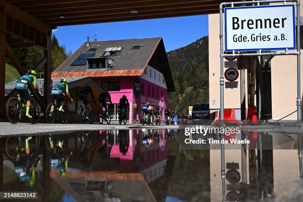 Sergio Higuita Garcia of Colombia, Cesare Benedetti of Italy and Team Bora – Hansgrohe and a general view of the peloton crossing the Brenner -...