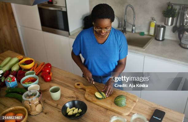 preparing lunch with fresh vegetables. - hourglass side stock pictures, royalty-free photos & images