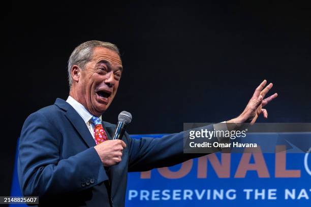 Nigel Farage, honorary president of the Reform UK party, gives a speech on Day 1 of The National Conservatism Conference at the Claridge on April 16,...
