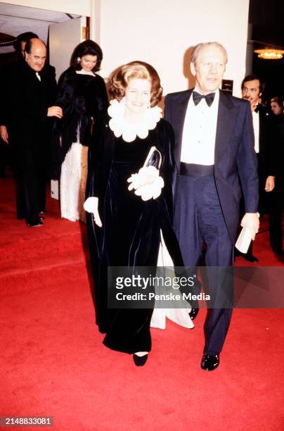 First Lady Betty Ford , President Gerald R. Ford , Jacqueline Kennedy Onassis and guests attend the party honoring Kennedy Center Chairman Roger...