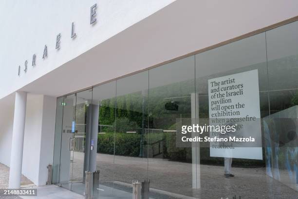 Sign is displayed at the Israel pavilion saying it will remain closed until a ceasefire in the war is reached during the 60th Biennale Art 2024 on...