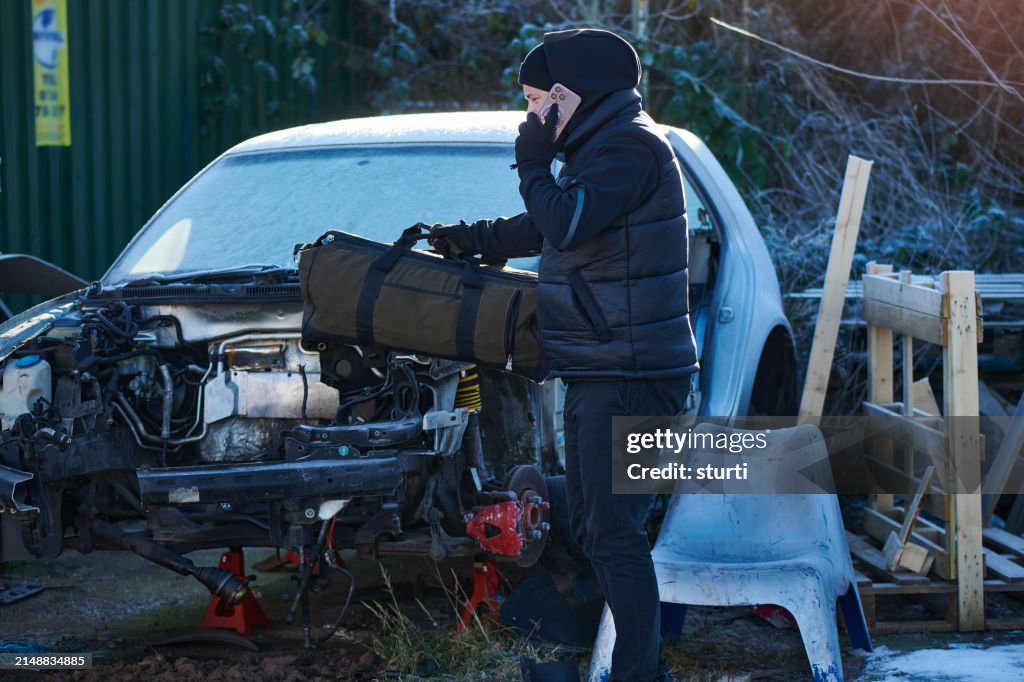 Suspicious man in scrap yard