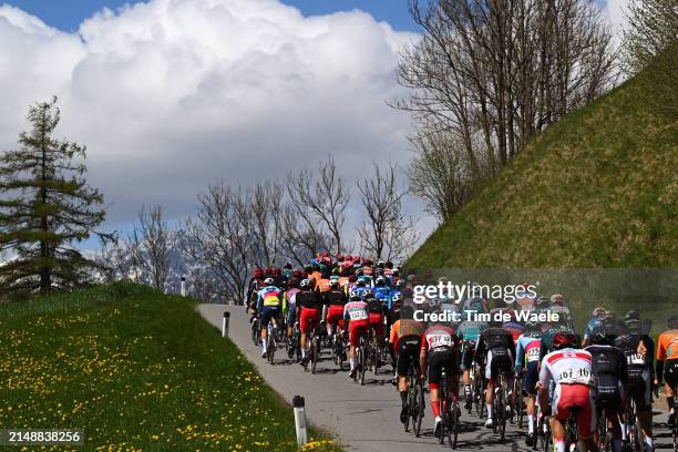 General view of the peloton climbing at Gemeinde Ellbögen with a background landscape of snowy mountains during the 47th Tour of the Alps 2024, Stage...