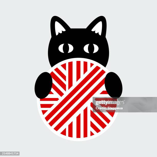 black cat with clew - ball of wool stock illustrations