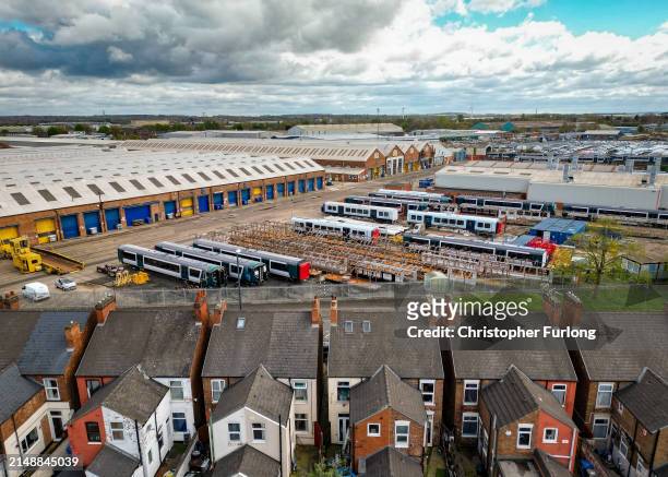 An aerial view of local homes and the Alstom train manufacturing facility and factory on April 16, 2024 in Derby, England. French manufacturer Alstom...