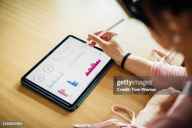 analyzing data on digital tablet - record-player-needle stock pictures, royalty-free photos & images