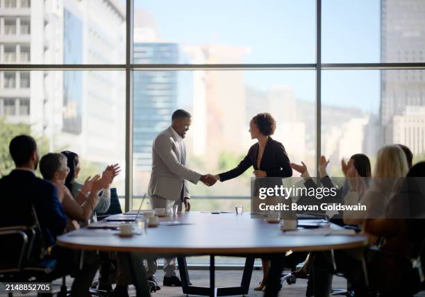 meeting, handshake and business people in office for interview, welcome applause or onboarding for collaboration. men, women and shaking hands in conference room for agreement, consulting or b2b deal - mergers and acquisitions stock pictures, royalty-free photos & images