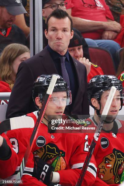 Head coach Luke Richardson of the Chicago Blackhawks looks on against the Carolina Hurricanes during the third period at the United Center on April...