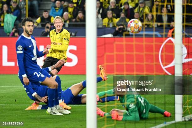 Julian Brandt of Borussia Dortmund scores his team's first goal during the UEFA Champions League quarter-final second leg match between Borussia...
