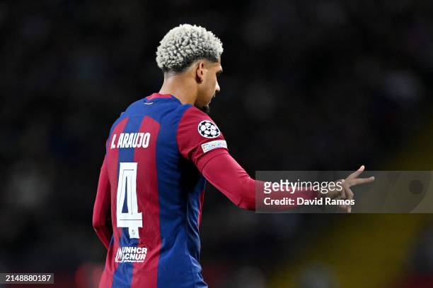 Ronald Araujo of FC Barcelona gestures as he leaves the pitch after being shown a red card by Referee Istvan Kovacs for a foul on Bradley Barcola of...