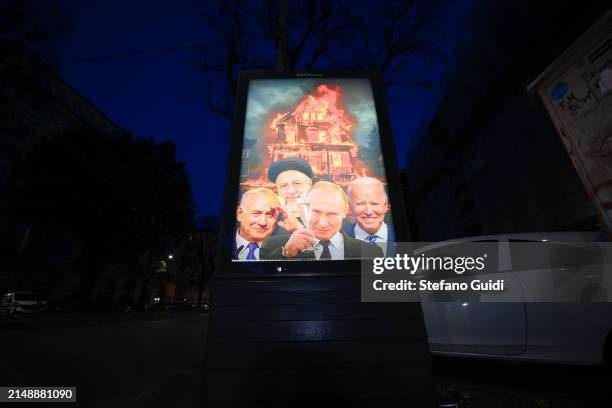 Street Artist Andrea Villa installs an Anti-War Poster, depicting world leaders Benjamin Netanyahu, Prime Minister of Israel, Ebrahim Raisi,...