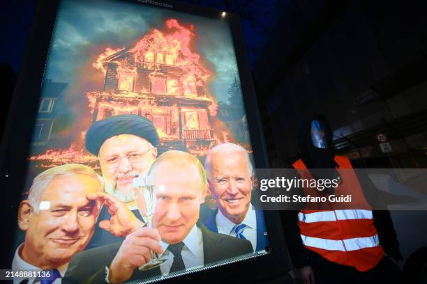 Street Artist Andrea Villa installs an Anti-War Poster, depicting world leaders Benjamin Netanyahu, Prime Minister of Israel, Ebrahim Raisi,...