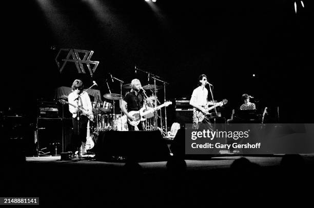 View of the members of New Wave group the Cars as they perform onstage at the Palladium, New York, New York, September 22, 1978. Pictured are, from...