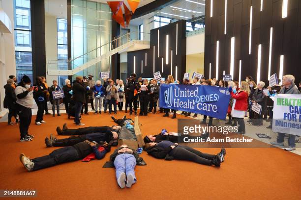 Protesters with People's Action target health insurance giant UnitedHealth Group due to exorbitant health insurance costs and insurance claims...