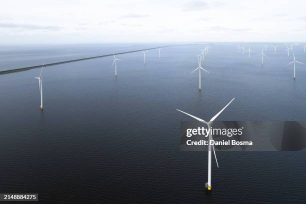 offshore wind farm seen from a drone point of view - afsluitdijk stockfoto's en -beelden