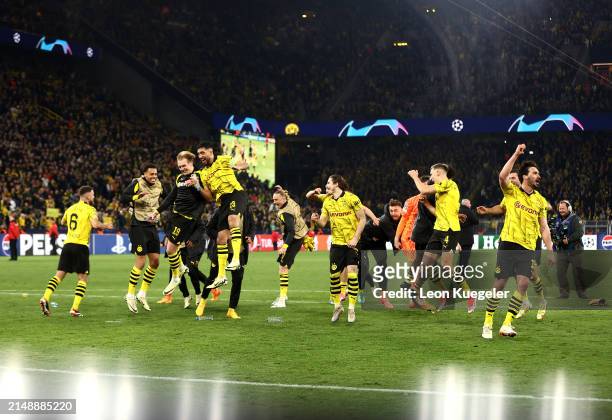 Players of Borussia Dortmund celebrate following the team's victory during the UEFA Champions League quarter-final second leg match between Borussia...