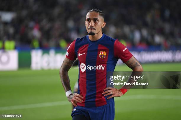 Raphinha of FC Barcelona looks dejected after the team's defeat in the UEFA Champions League quarter-final second leg match between FC Barcelona and...