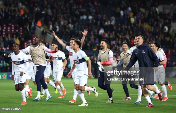 Players of Paris Saint-Germain celebrate victory in the UEFA Champions League quarter-final second leg match between FC Barcelona and Paris...