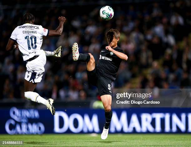 Hidemasa Morita of Sporting CP and Chiquinho of FC Famalicao battle for the ball during the Liga Portugal Bwin match between FC Famalicao and...