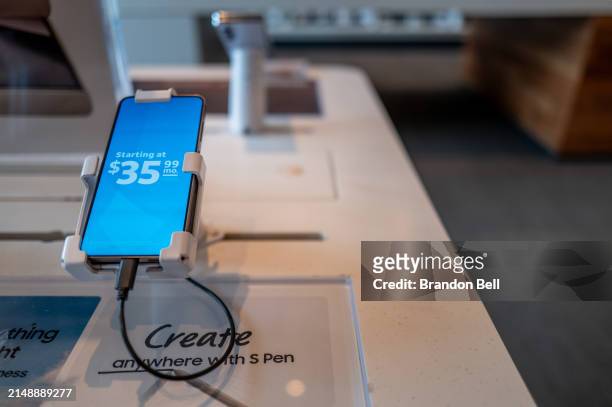 Samsung smartphone sits on display at an AT&T store on April 16, 2024 in Austin, Texas. Samsung has become the top phonemaker as Apple smartphone...