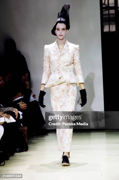 Model Hannelore Knuts walks in the Junya Watanabe Fall 1999 Ready to Wear Runway Show on March 10 in Paris, France.