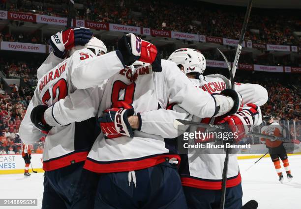 Alex Ovechkin and the Washington Capitals celebrate his goal against Samuel Ersson of the Philadelphia Flyers at 18:08 of the first period at the...
