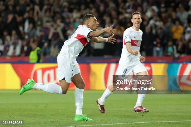Kylian Mbappe of PSG celebrates his first goal on a penalty kick with Fabian Ruiz Pena during the UEFA Champions League quarter-final second leg...
