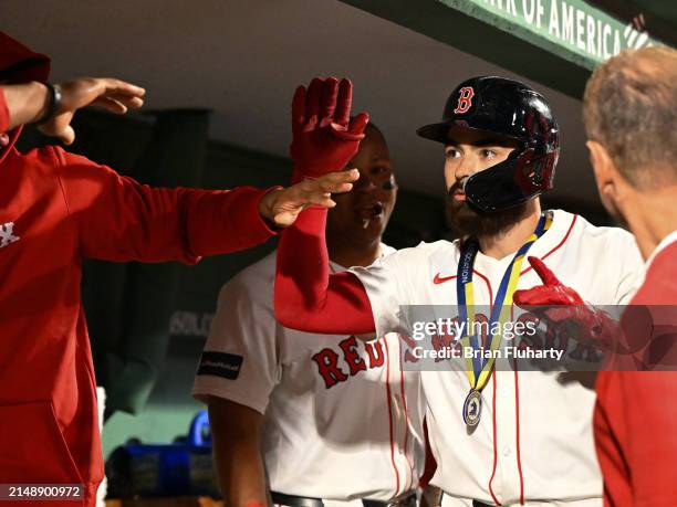 Connor Wong of the Boston Red Sox celebrates his two-run home run against the Cleveland Guardians in the sixth inning at Fenway Park on April 16,...