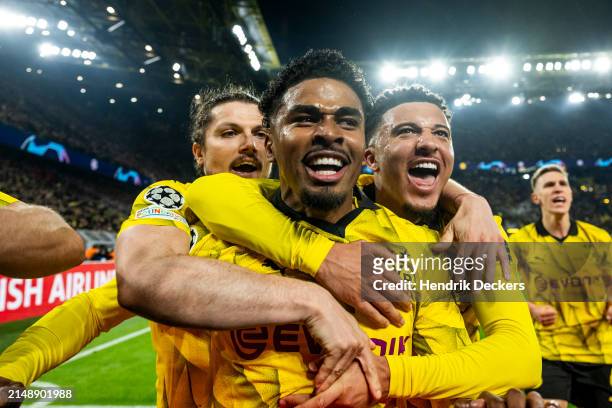 Ian Maatsen of Borussia Dortmund celebrates with his teammates Marcel Sabitzer and Jadon Sancho after scoring the 2-0 lead during the UEFA Champions...