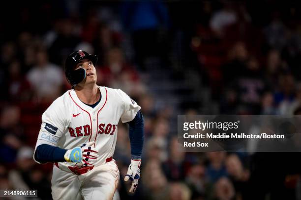 Triston Casas of the Boston Red Sox rounds the bases after hitting a home urn during the sixth inning of a game against the Cleveland Guardians on...