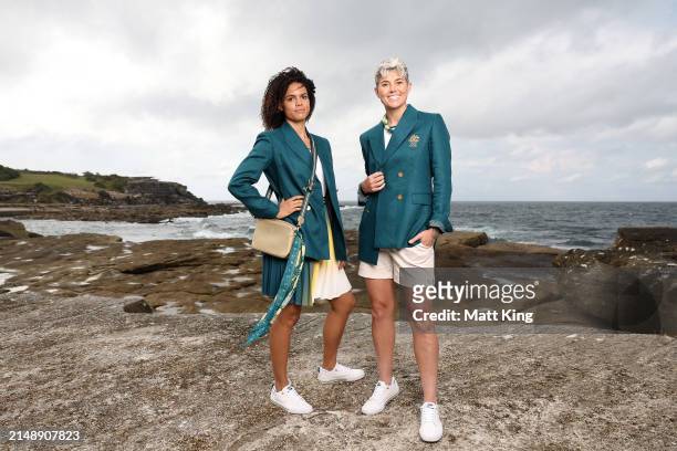 Australian athletes Torrie Lewis and Michelle Heyman pose during the Australian 2024 Paris Olympic Games Official Uniform Launch at Clovelly Surf...